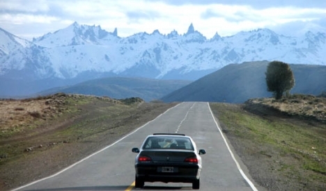 What is behind the compulsory insurance for foreigners traveling by car to Chile ?